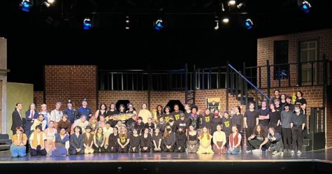 The cast and crew of Urinetown pose for a group picture. Credit: Skyline Theatre