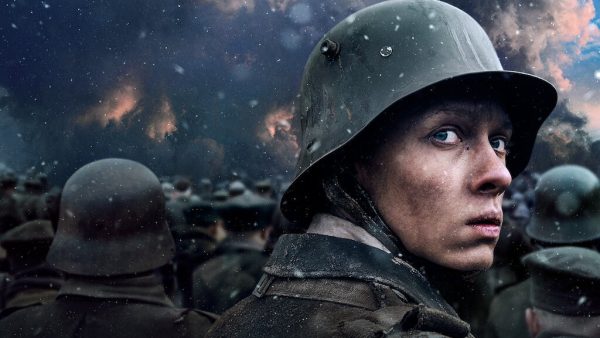 Paul Bäumer from the film adaptation looks back as he walks towards enemy trenches. Credit: Netflix
