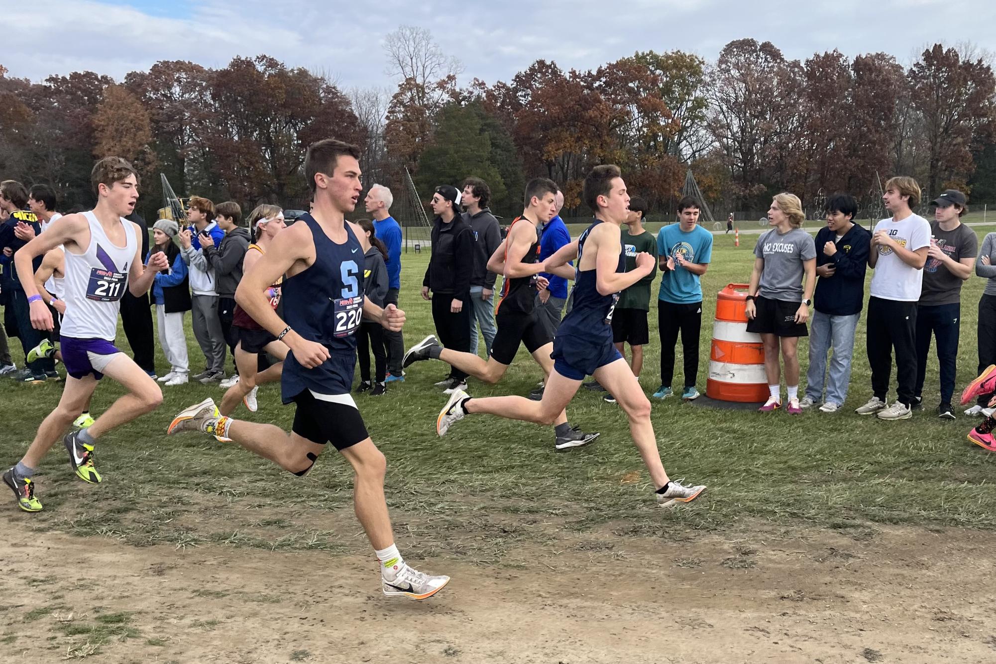 Mason Jett (’24) and Luke Suliman (’24) work together to pass competitors. Credit: C. Brush.