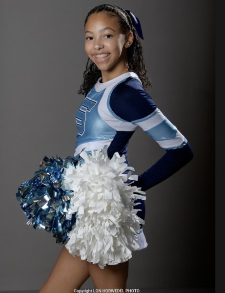 Torie Patterson ('28) posing for Skyline Pom Media Day photos.