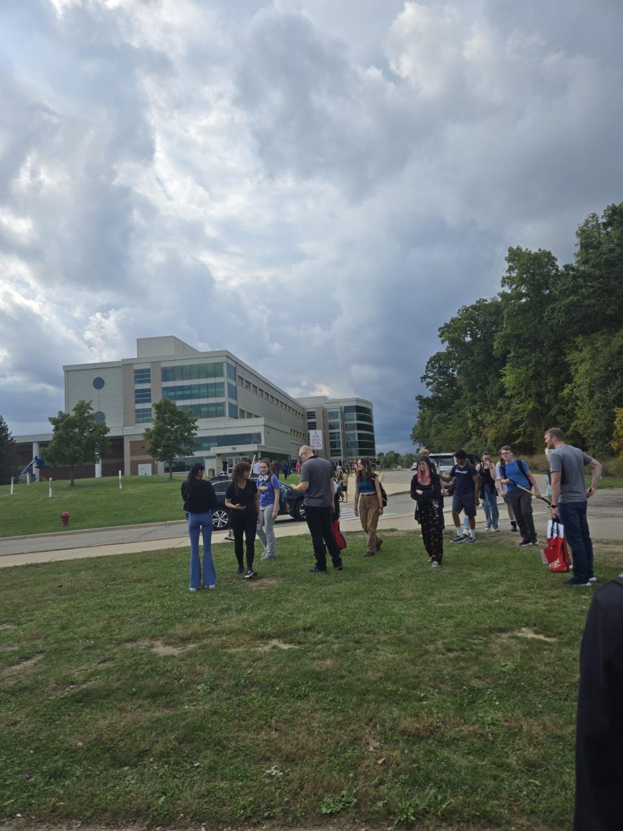 Students and teachers gather outside during the October 2nd after-school fire drill.