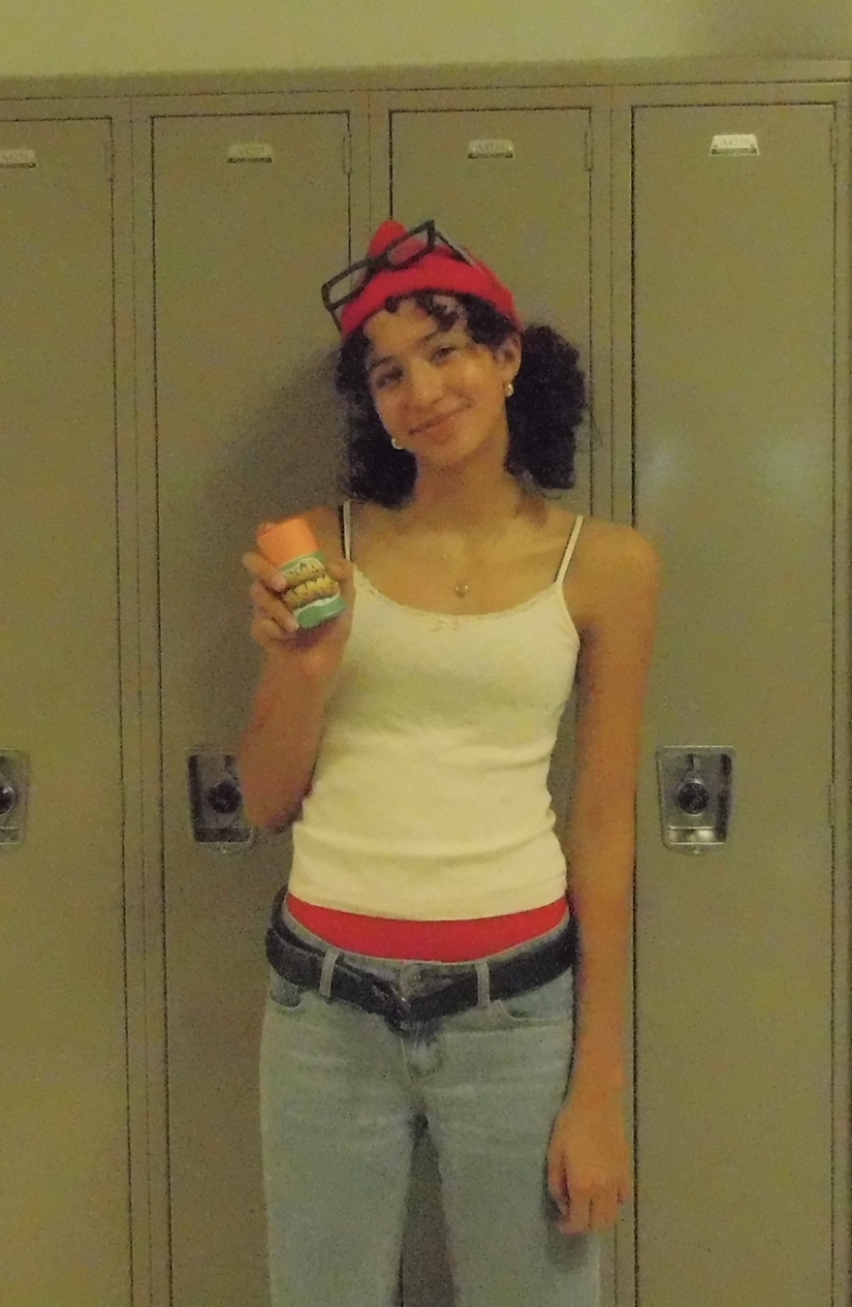 Reed Jemison-Blais ('28) dresses up as Tricky from the game Subway Surfers, wielding her trusty spray can.