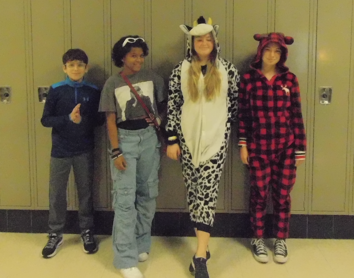Caden Parkhurst ('28), Iasha Banks ('28), Clarissa Lorenz '(28), and Livi Byers ('28) show off their Halloween costumes.