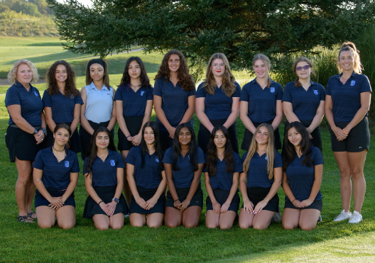 The girls golf team before a big season match.
