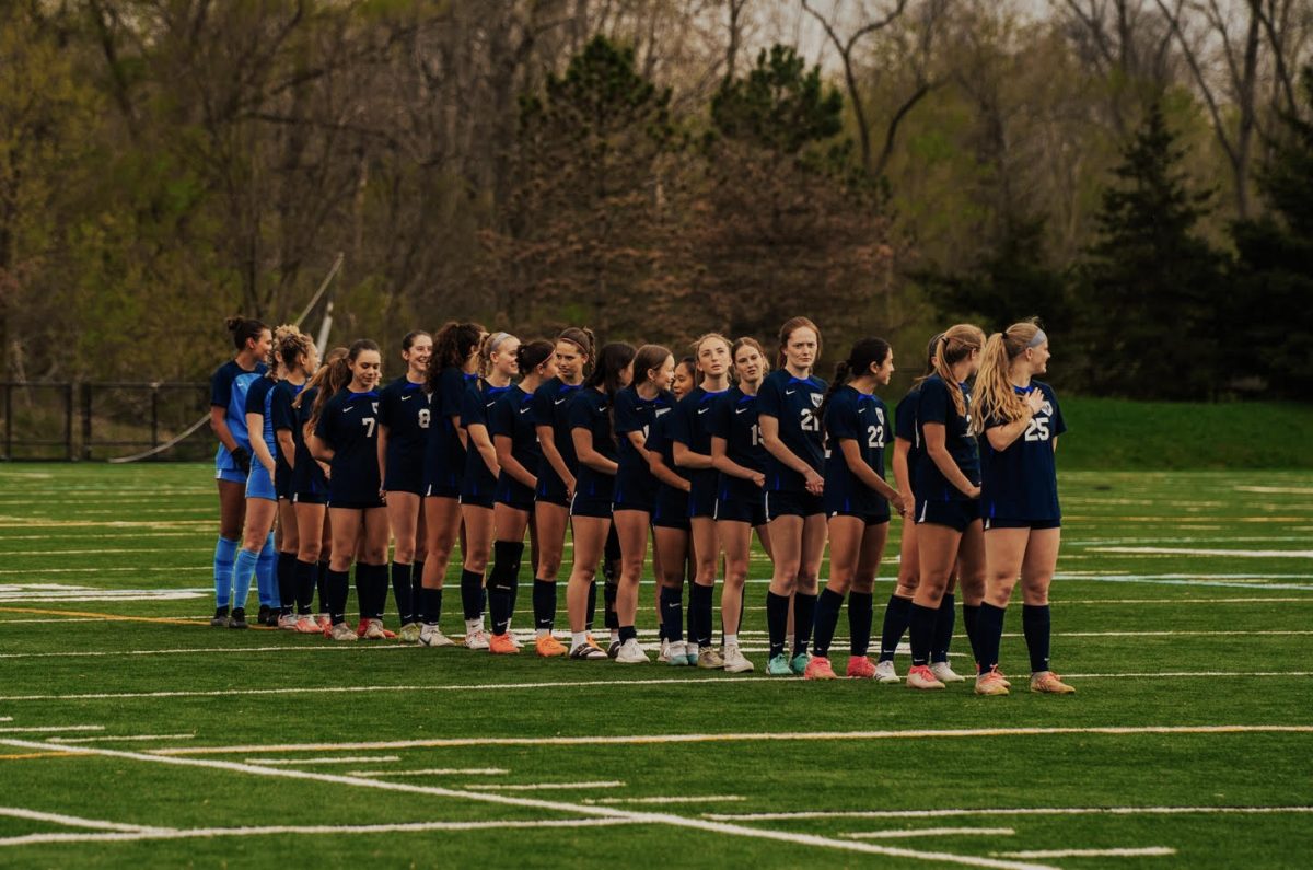 The women's soccer team prepares for a game.