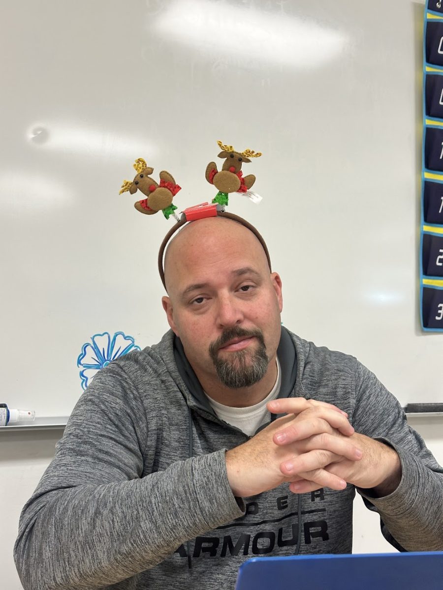 Craig Jobe, and his festive headband, do not seem very amused.