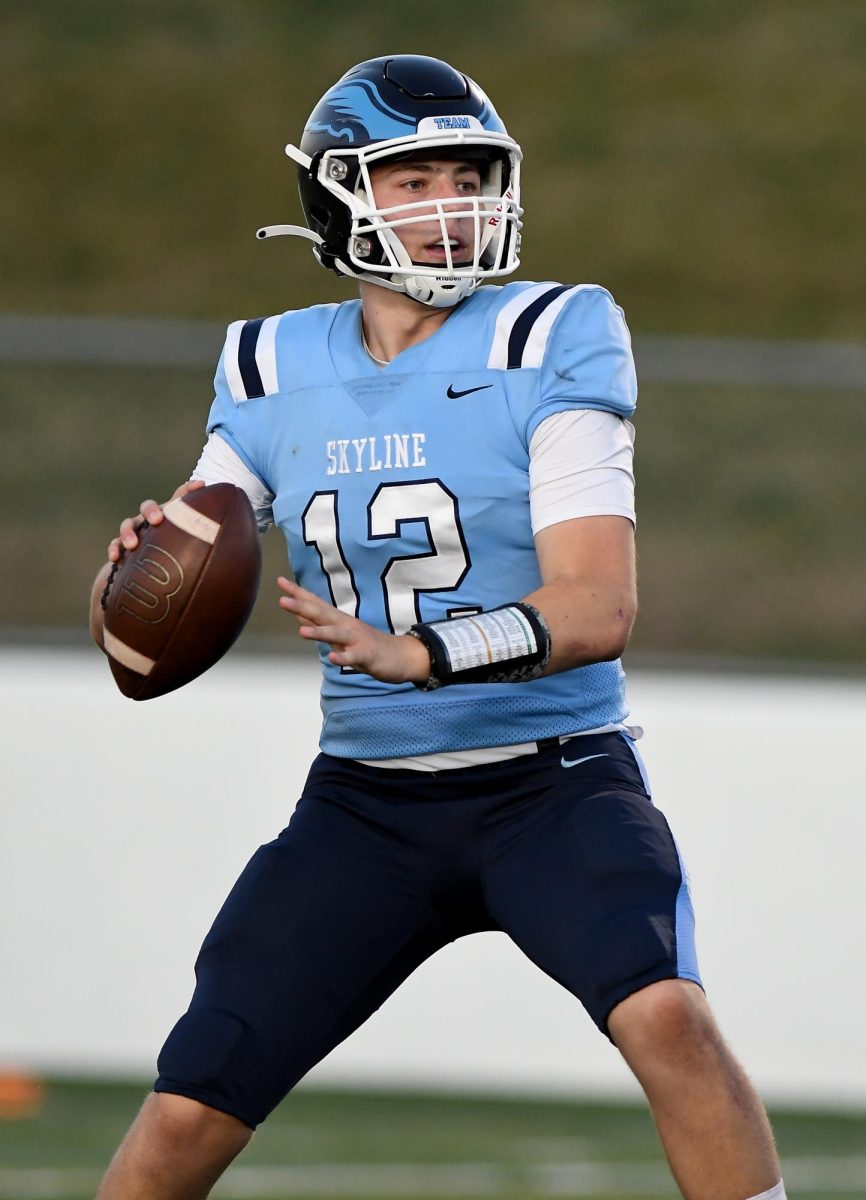 Evan Rothenberg ('23) mid throw in the, 9-9-22 Skyline High School vs Monroe High School varsity football game.