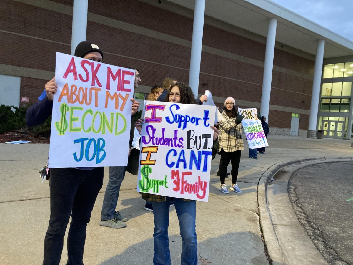 Ann Arbor Skyline teachers holding signs during an informational picket on December 10, 2024.