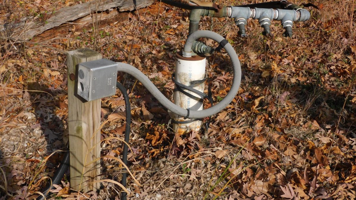 The broken pump, previously used to pump water into a pond that maintained water levels for the salamanders. 