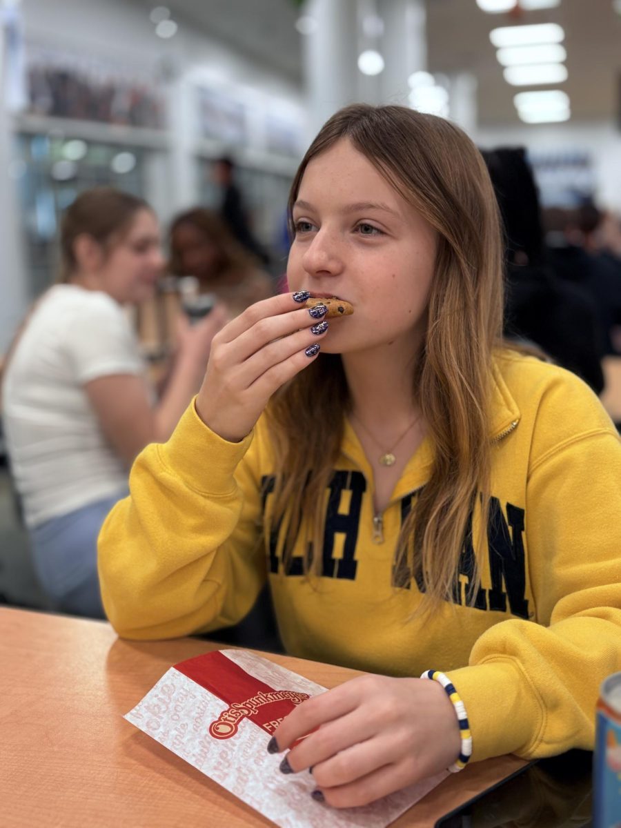 Claire Hegwood ('28) trying one of the Skyline Store's new 'economy' cookies, November 20th 2024