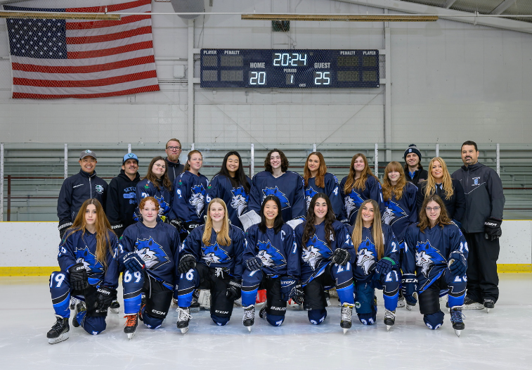 Skyron Varsity Women's Ice Hockey team posing for media day.