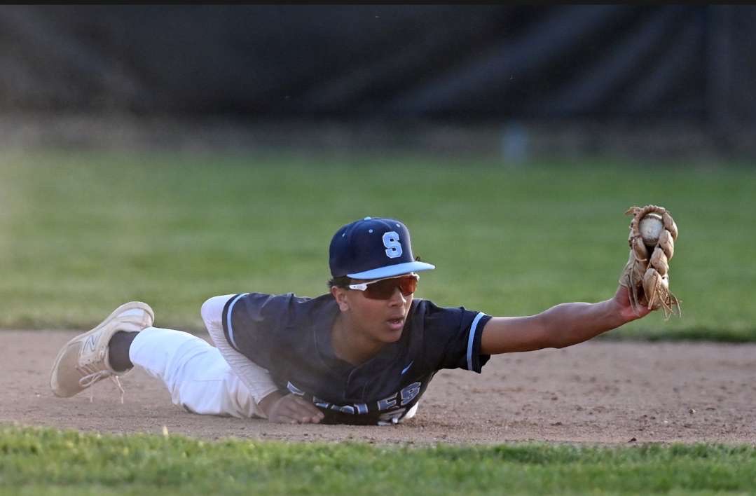 Nehith Kumar ('25) dives for a catch!