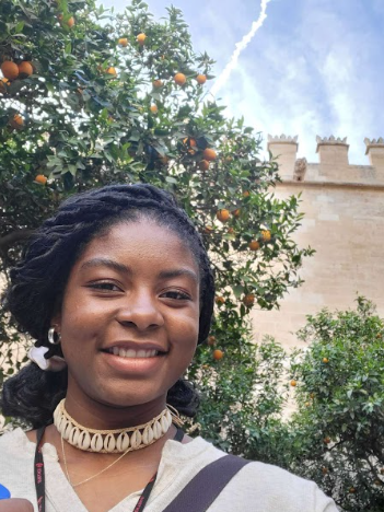 Jahzara Hamilton ('25) at the "Lonja" in Valencia, Spain. The garden was fragrant with orange blossom!