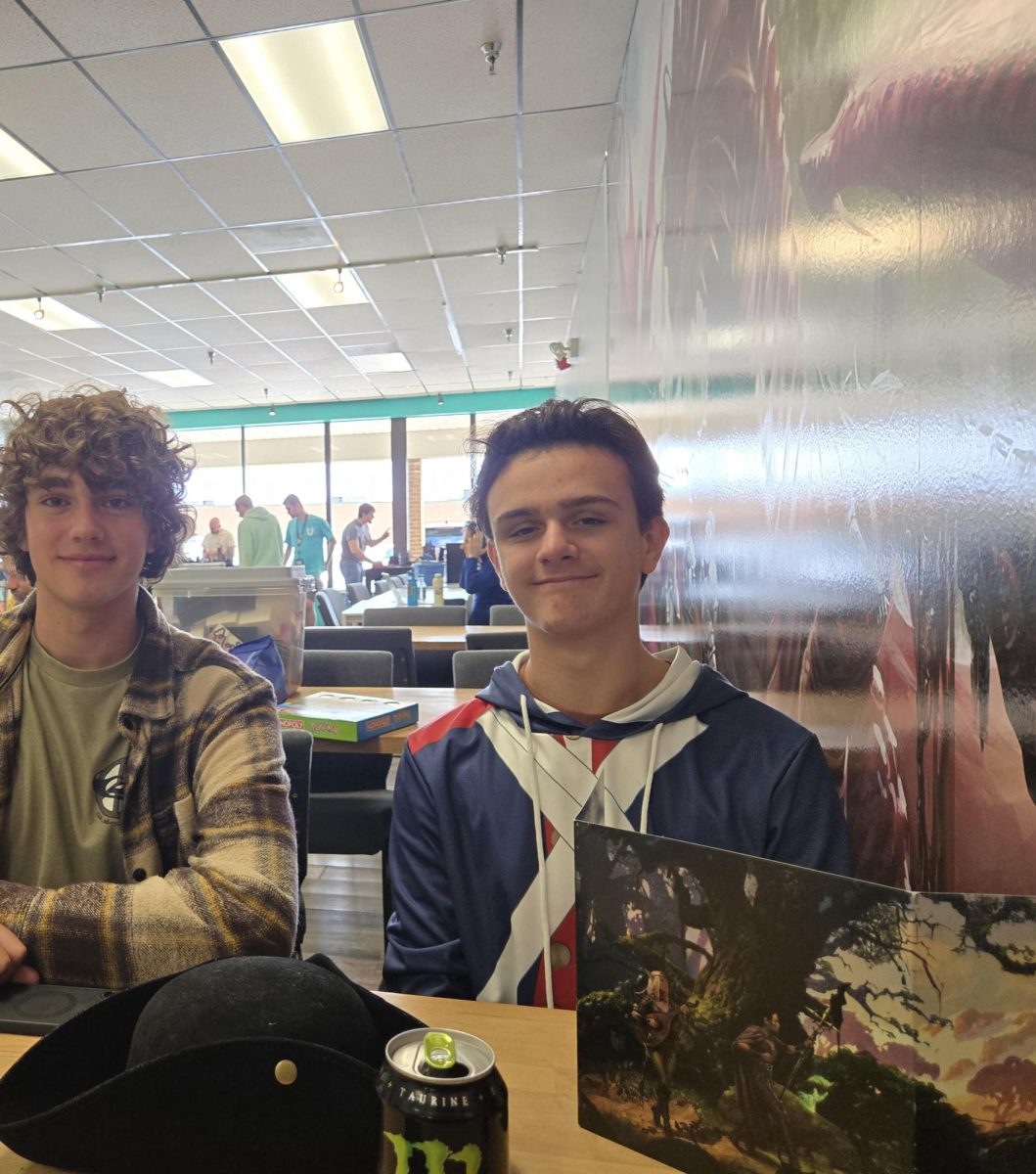 From left to right: Owen DeVries ('27) and Dominic Marroni ('26) play D&D.