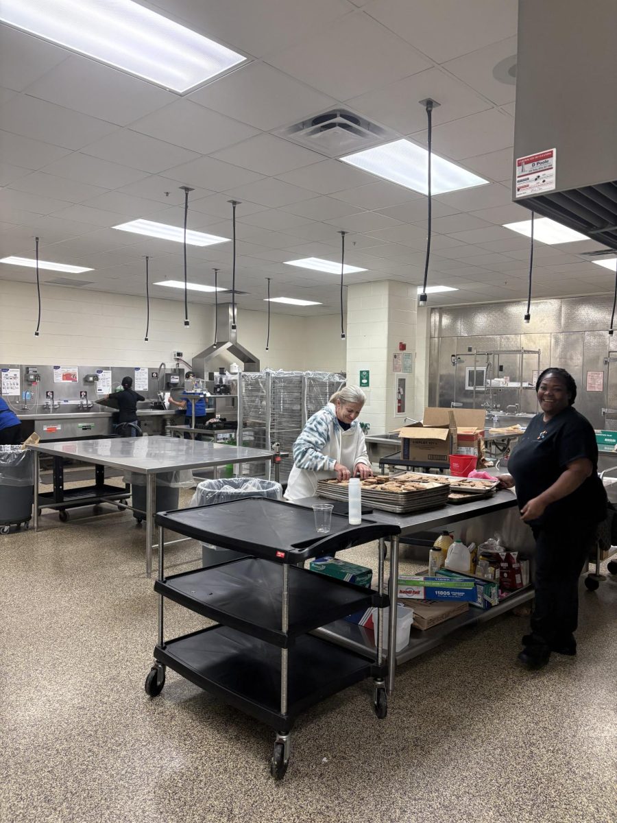 Skyline cafeteria staff prepare lunch for the hungry hoard.