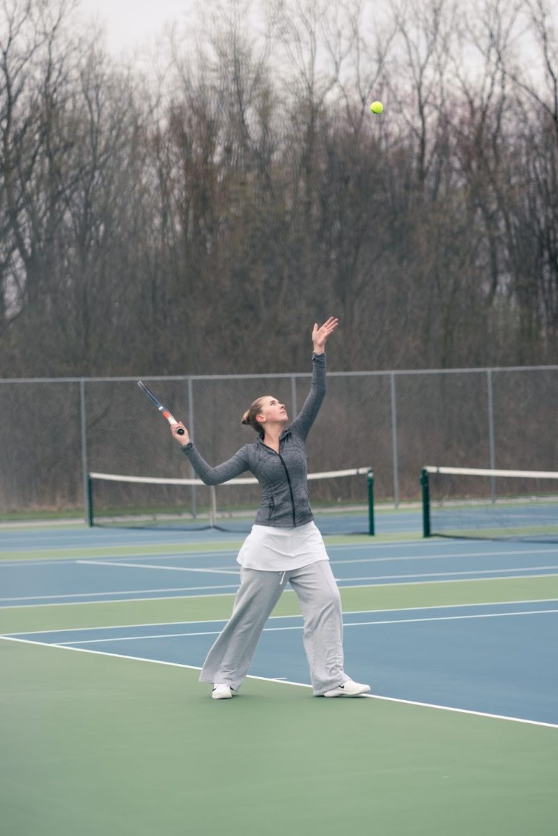 Olivia Watters ('26) serving at a quad in spring of 2025.