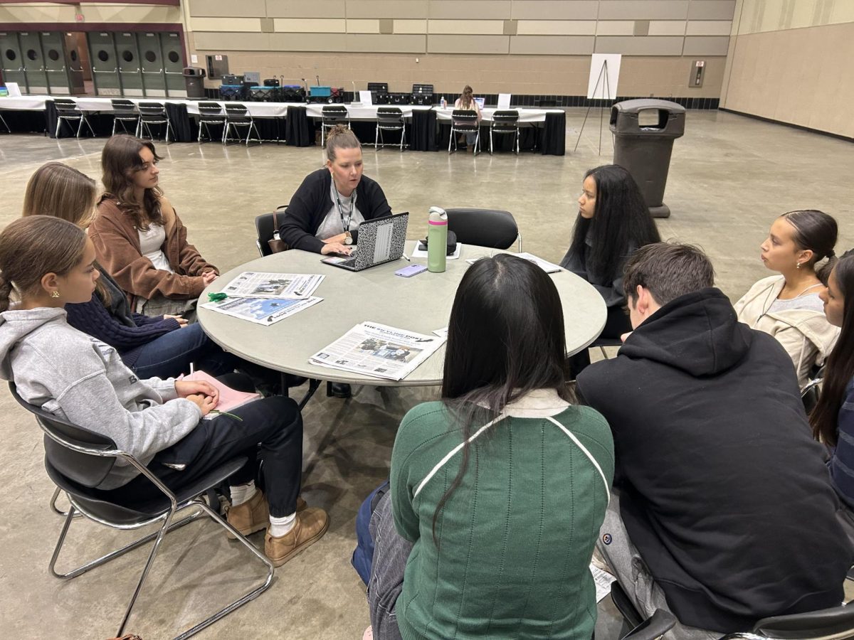Skyline journalists receive feedback on newspaper.

