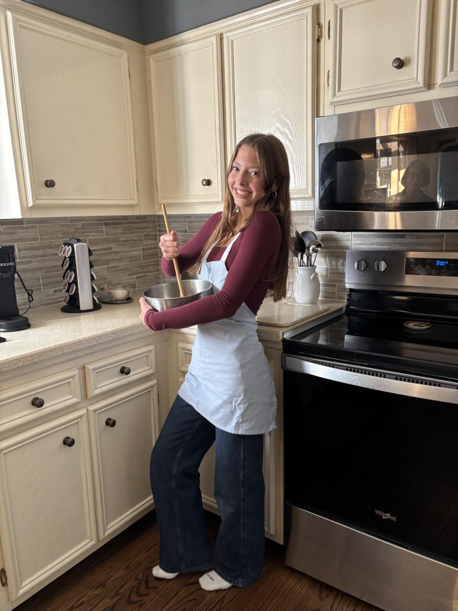 Claire Williams ('29) baking at her Grandparents' house.