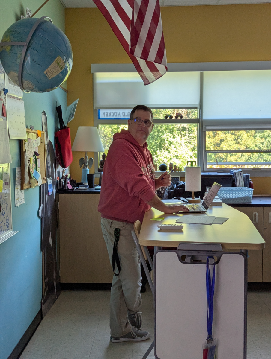 Brian Thomas Teaching Economics during 4th hour.