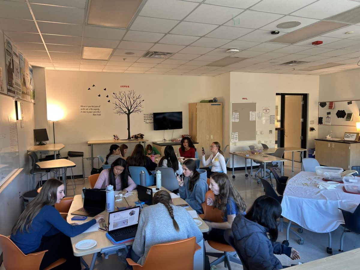 Members of the Cooking for a Cause Club work on recipe cards during a meeting, October 27th, 2025.