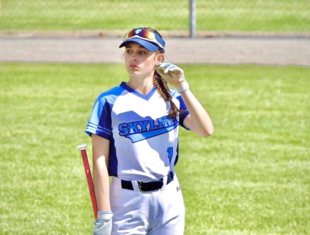 Peyton Quinn playing softball.