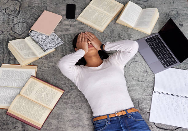 Overwhelmed student struggling with the overdo work. Cr. Getty Images; iStock photos