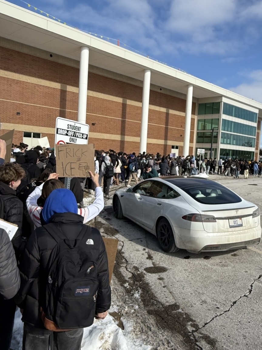 Skyline students come together to participate in a protest march around the school.