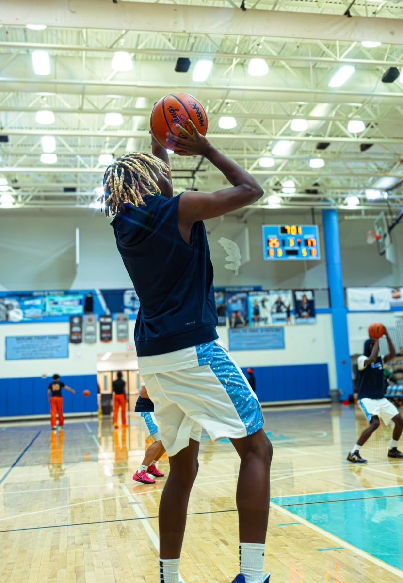 Raymond McBride ('29) warming up for a game against Jackson High School.