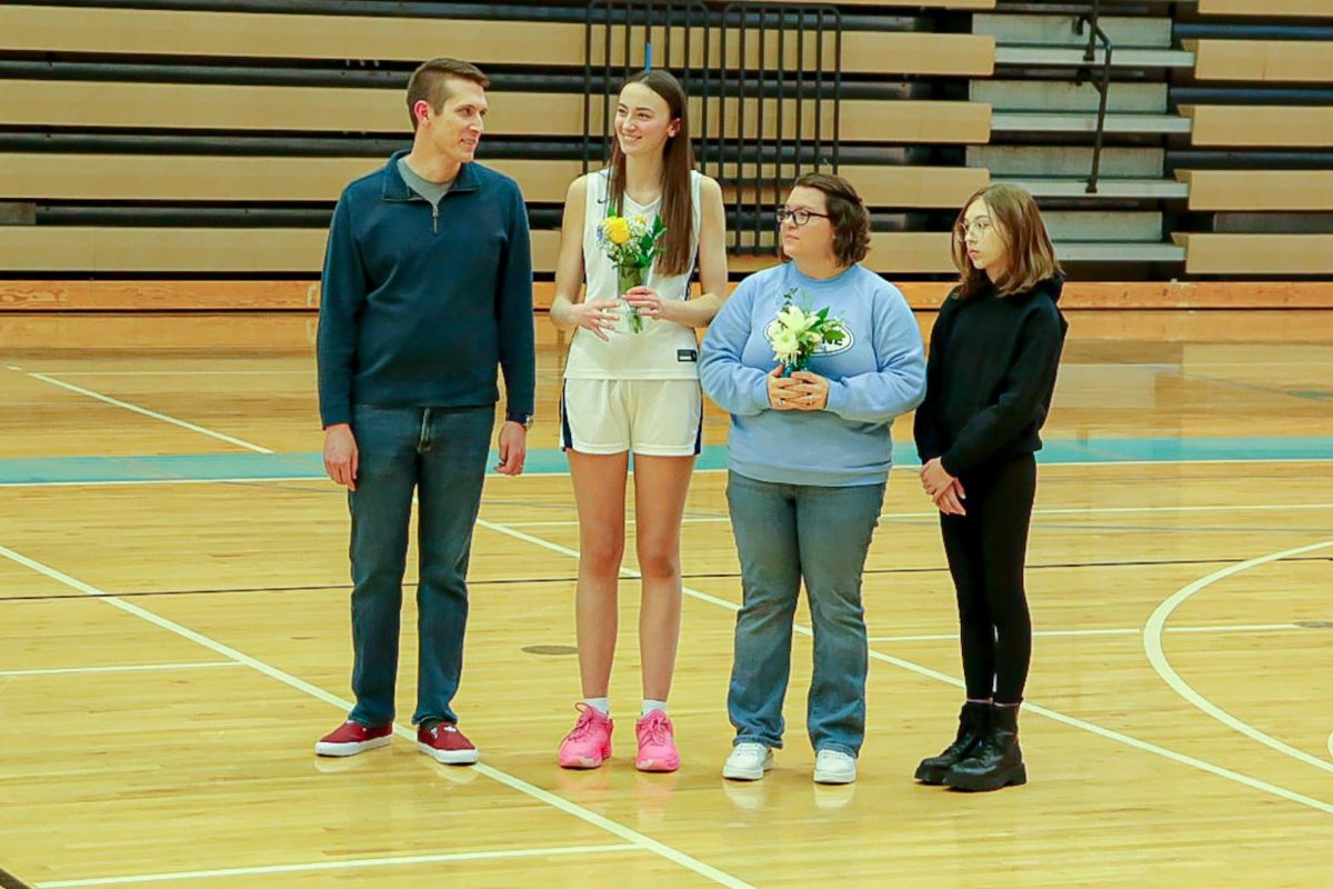Alice with her host family on senior night