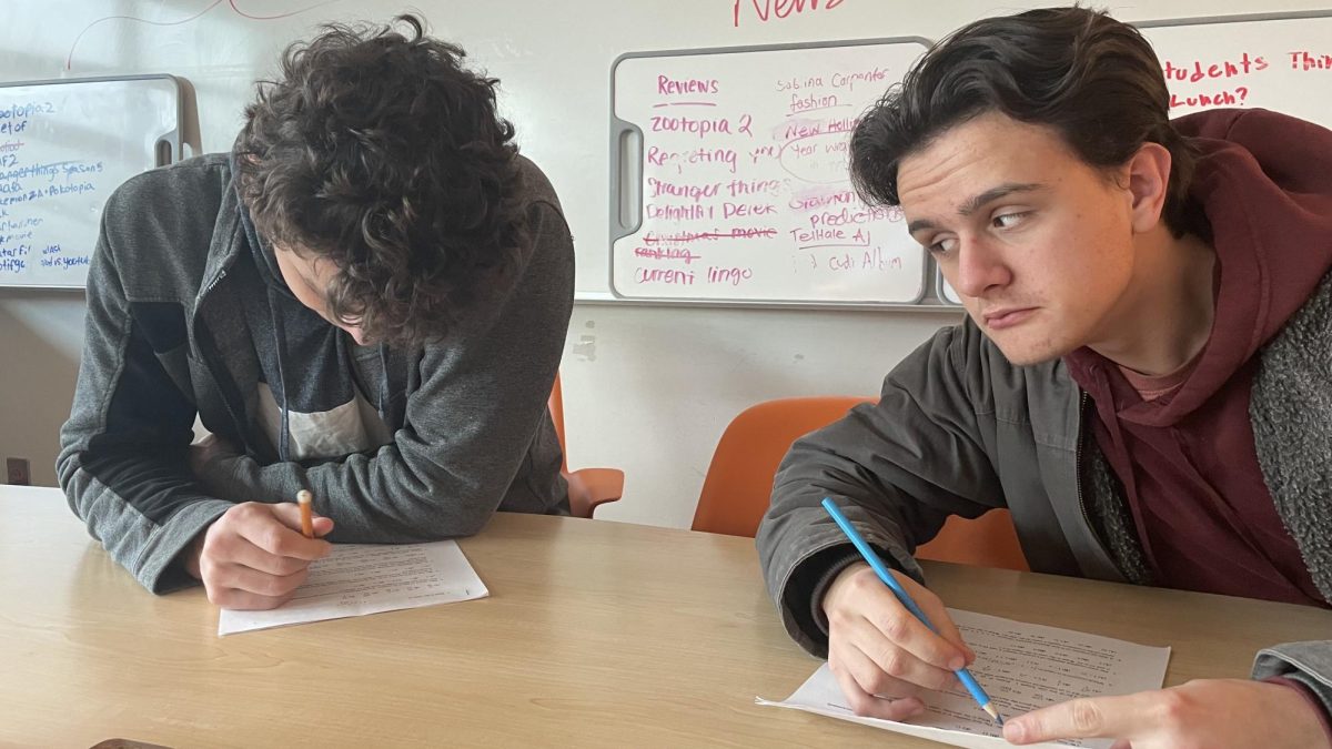 Two students simulate the cheating experience at Skyline High School. (Staged)