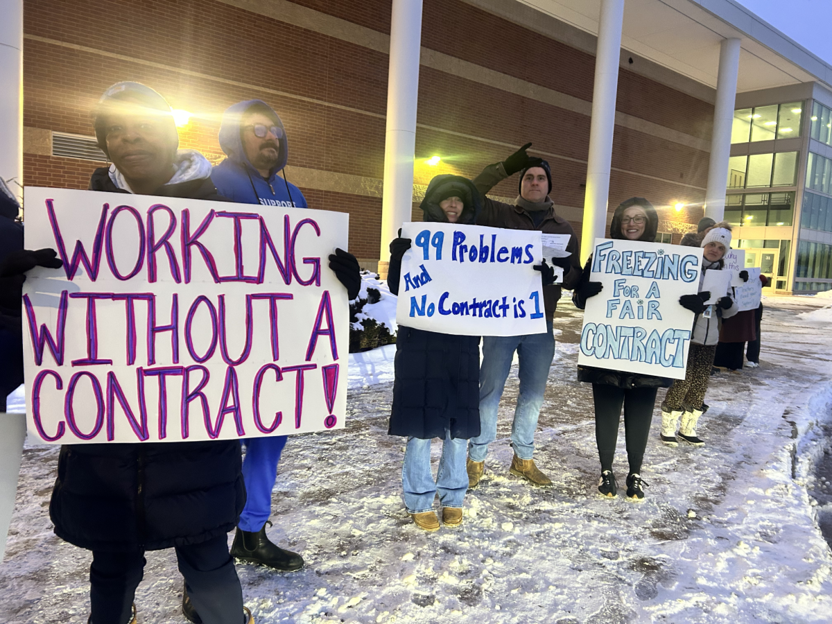 Skyline High School staff hold an informational picket in freezing conditions to raise awareness on the lack of a contract. Credit: Skyline Post Staff