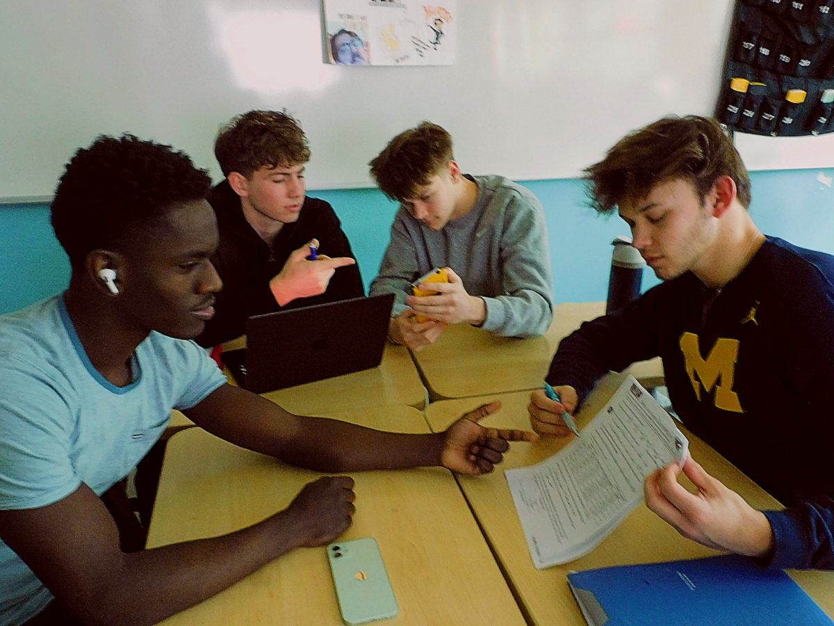 Students review AP Statistics material in class as major exam changes are set to take place.