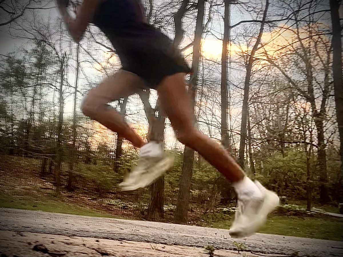 Track runner going on a run