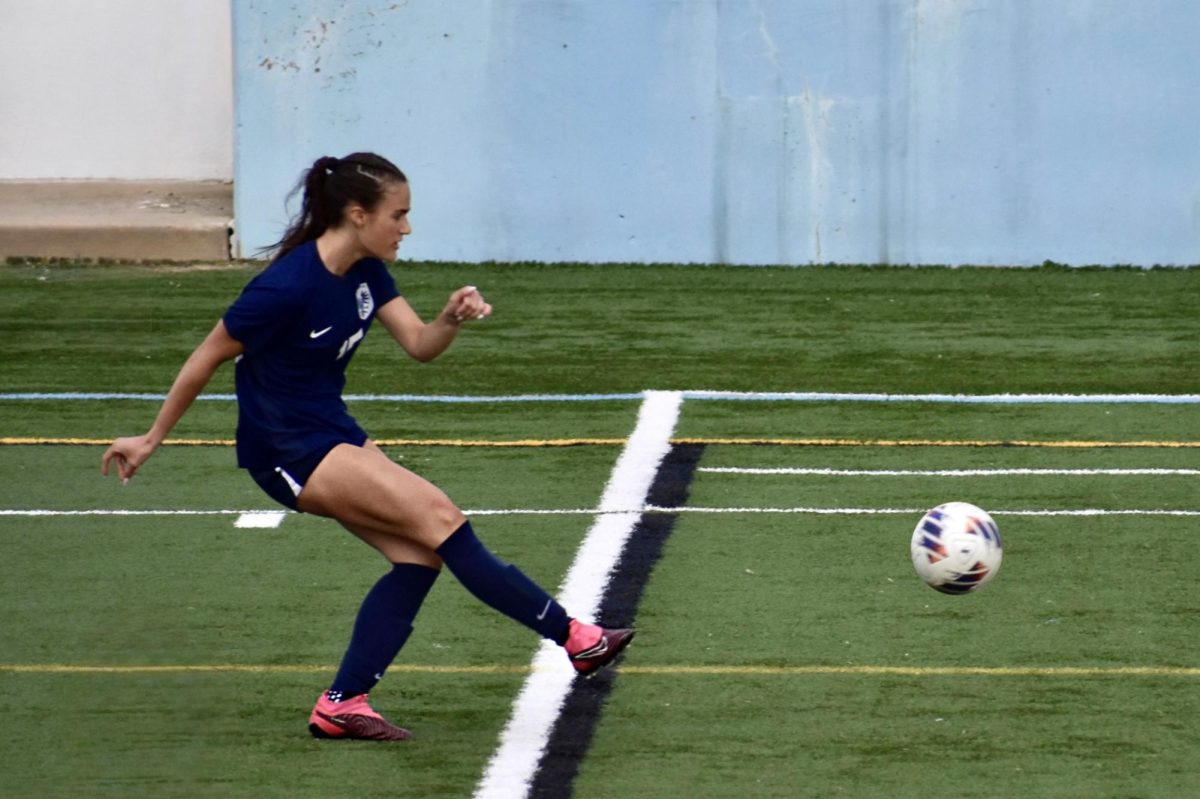 Adira Maze ('26) passes a ball in a game against Dexter at Skyline.