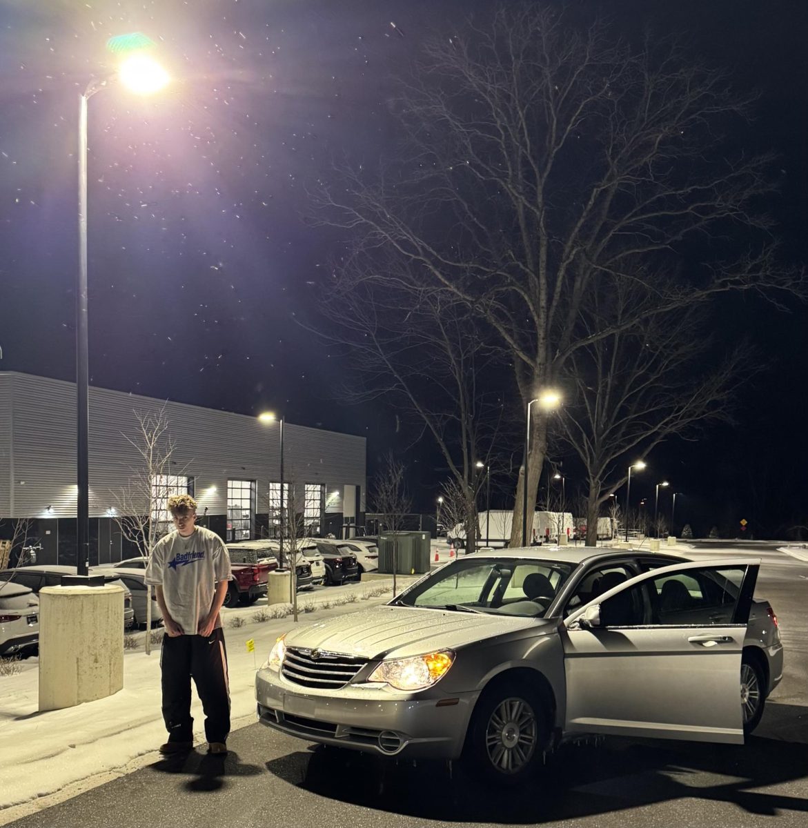 Henry Ward with his car in Ann Arbor, Michigan.