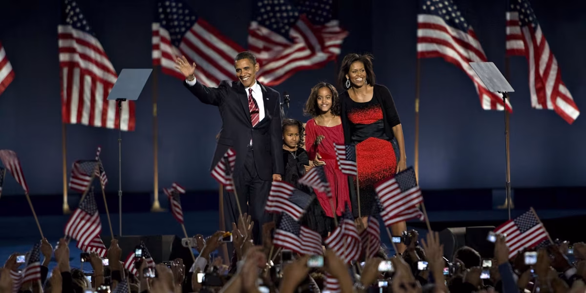Obama and his family win the 2008 presidential election.