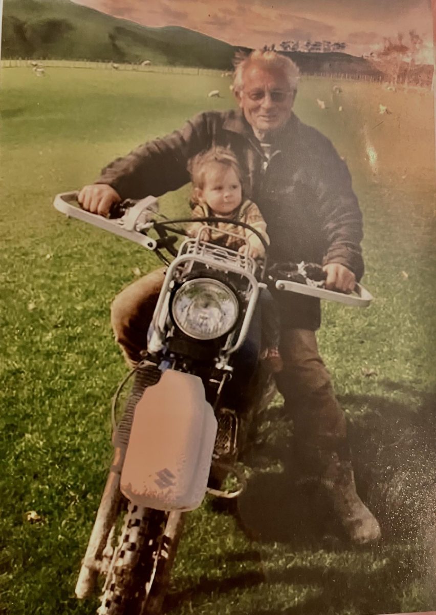 Adelaide riding a motorcycle.